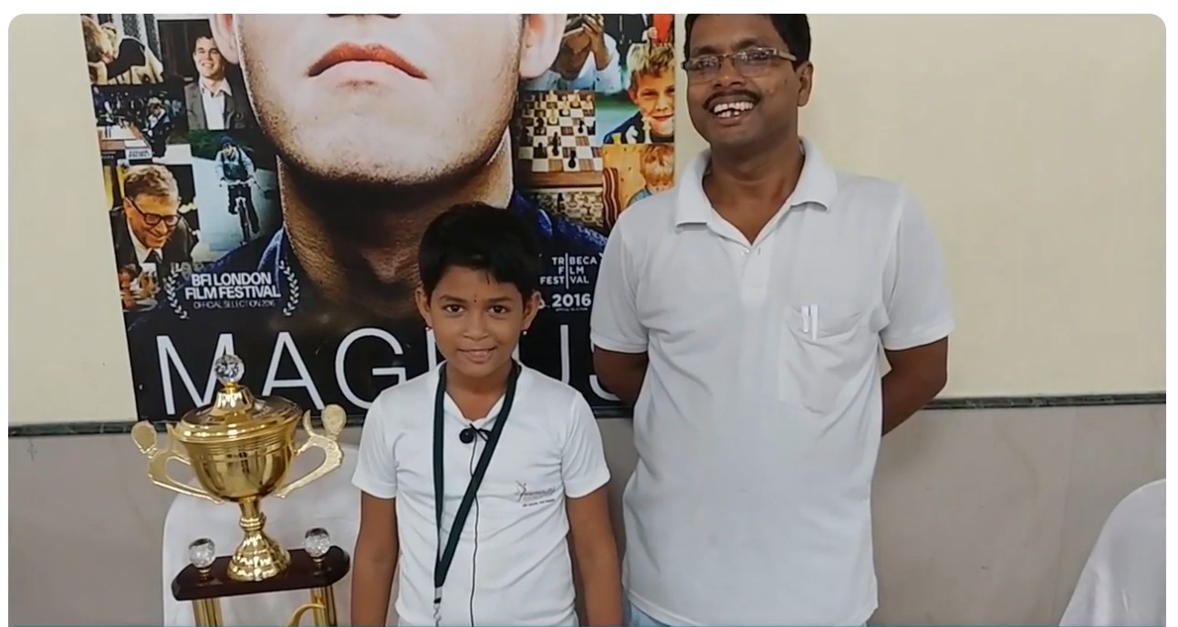 Sneha with her dad — her first coach